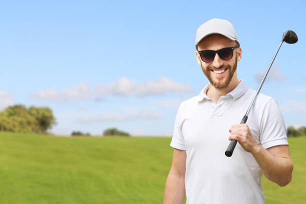 istock Golfer with golf club 653055542
