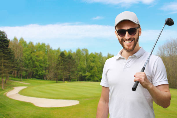 istock Golfer with golf club 653055568
