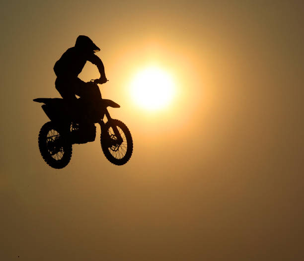 istock Motorcycle jumps in the air 653058590