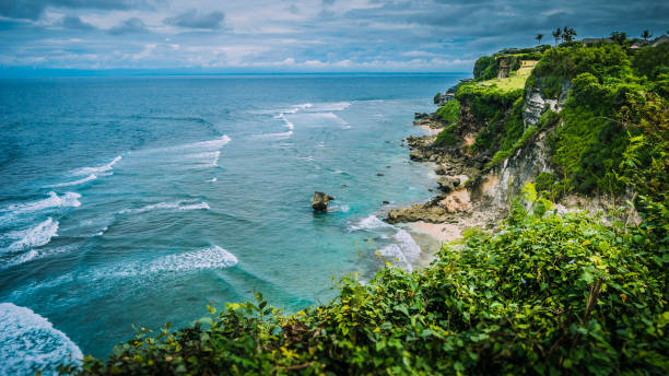 istock Rock on Impossible Beach in Evening Light, luxus cottage on the hill, Bali Indonesia 653059048