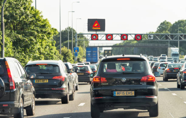 traffic jam on an english motorway - traffic jam traffic sports utility vehicle car imagens e fotografias de stock