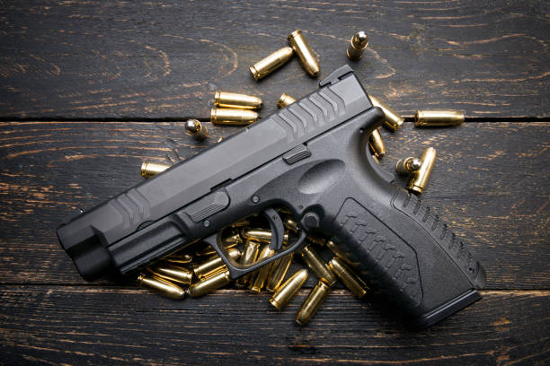 istock Group of Bullets and Gun 653061336