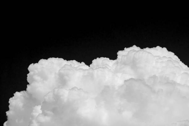 istock Closeup cumulus cloud isolated on black background 653061368