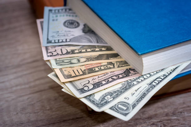 us dollar inside book. financial concept. stock photo