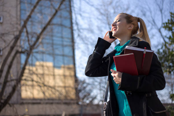 istock Businesswoman talking on mobile phone 653062168