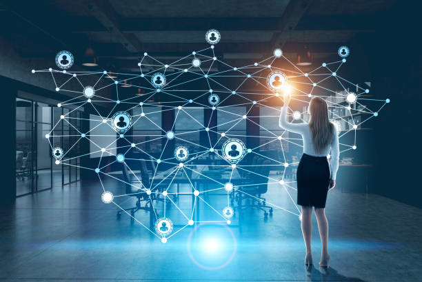 istock Rear view of woman and network 653064644