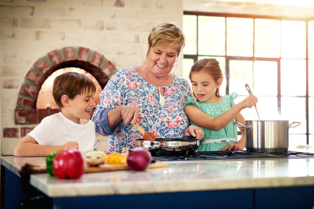 istock Grandma is so lucky to have two little eager helpers 653069314
