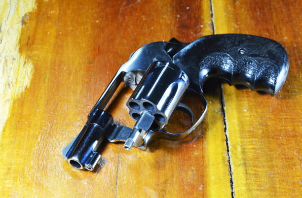 istock revolver gun without bullet 653071814