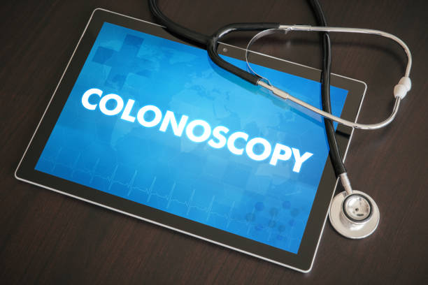 Colonoscopy (gastrointestinal disease related) diagnosis medical concept on tablet screen with stethoscope stock photo
