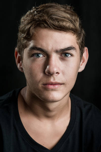 Serious Teenager Boy Green Eyes Black Tshirt Stock Photo - Download Image Now - 16-17 Years, Attitude, Beautiful People - iStock Serious Teenager Boy Green Eyes Black Tshirt Stock Photo - Download Image Now - 16-17 Years, Attitude, Beautiful People - iStock