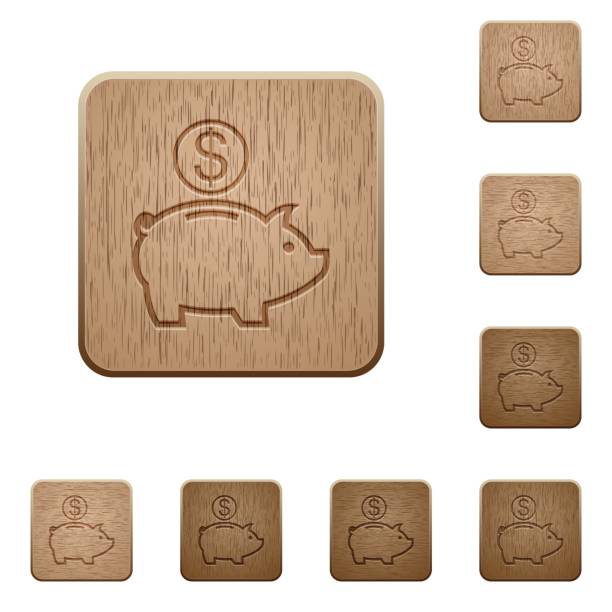 istock Dollar piggy bank wooden buttons 653094542