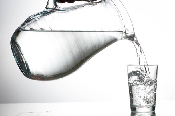 istock Filling in glass of water 653094836