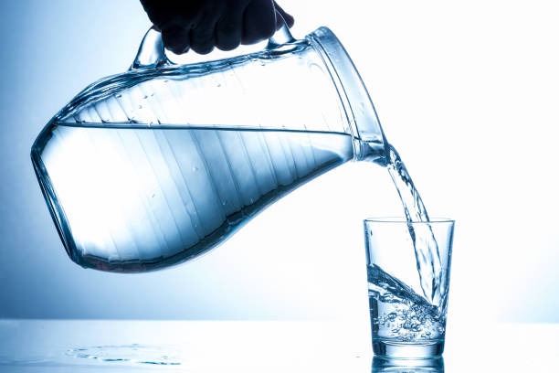istock Filling in glass of water 653098768
