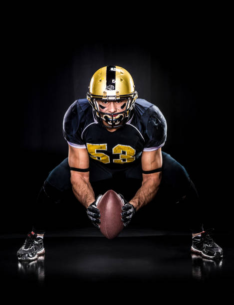 istock American football player in uniform 653102202