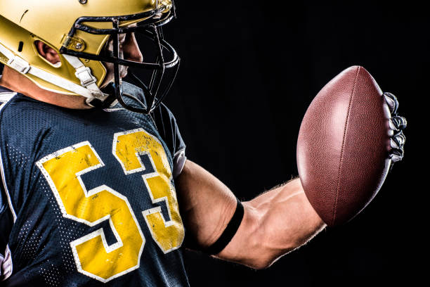 istock American football player in uniform 653102306