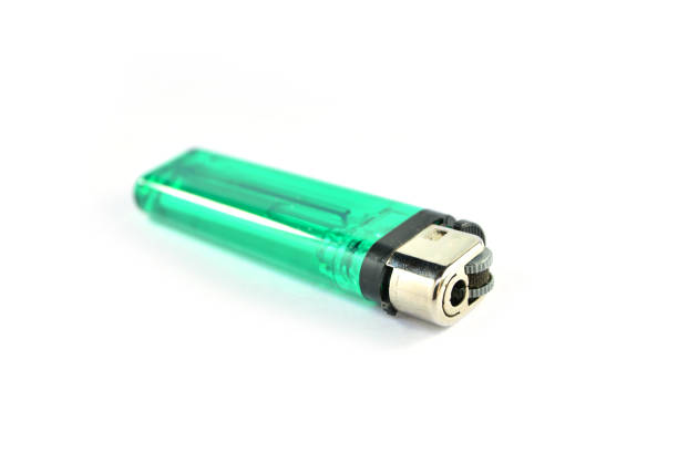 istock Green gas lighter isolated on a white background. 653102386