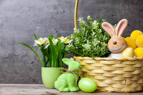 istock Easter holiday basket with a bunny, eggs and flowers 653106742