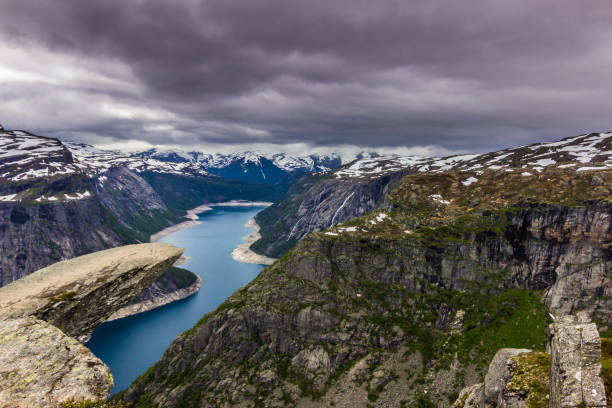 istock July 22, 2015: The famous edge of Trolltunga, Norway 653111670