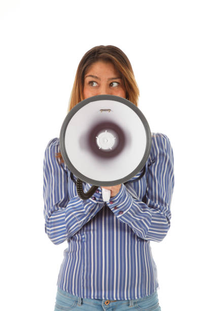 istock young cute woman with megaphone on white background 653111968