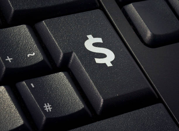 istock Keyboard with return key in the shape of a Dollar symbol.(series) 653119536