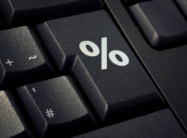 istock Keyboard with return key in the shape of a percent symbol.(series) 653119554
