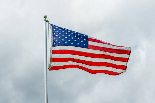 istock American Flag Waving in the Wind 653123744