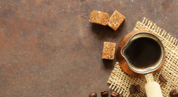 istock copper cezve coffee and grains on a steel background 653138312