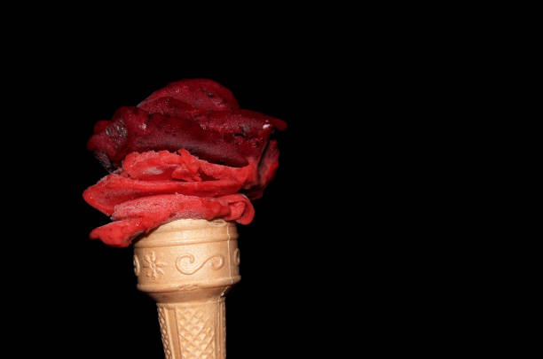 istock Delicious strawberry ice cream on a black background (Turkish dondurma) 653138548