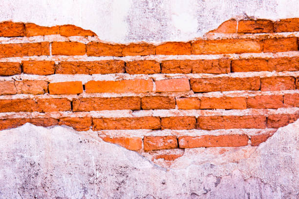 istock Brick,concrete weathered grunge wall background 653141050