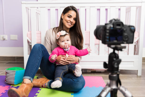 istock Cute mom doing parenting blog 653141556