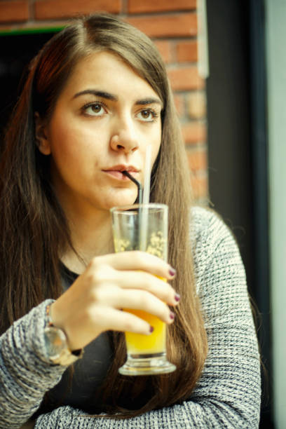 istock Young women sitting in cafe 653146790