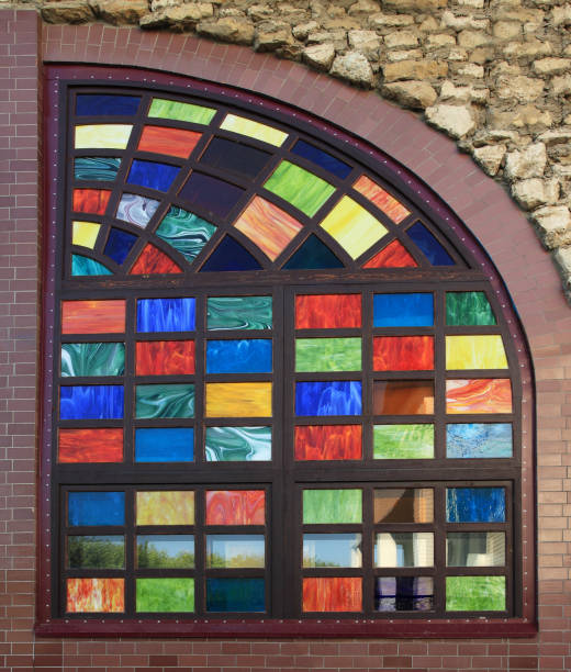 istock Texture of the old multi-colored stained-glass windows, background. 653148028