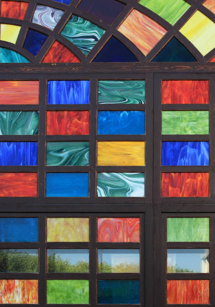 istock Texture of the old multi-colored stained-glass windows, background. 653148946