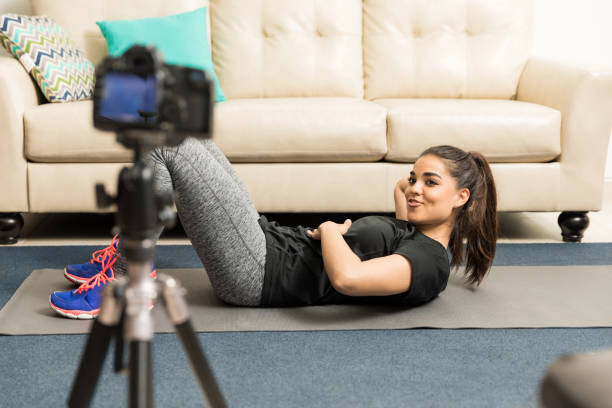 istock Fitness blogger and coach recording video 653148972