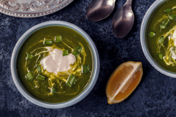 istock Bowls with green soup 653148994