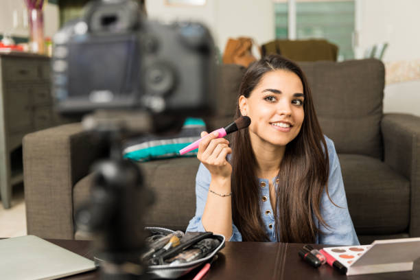 istock Hispanic woman doing a beauty blog 653149652