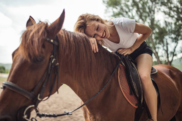 istock Woman loves horses 653156004