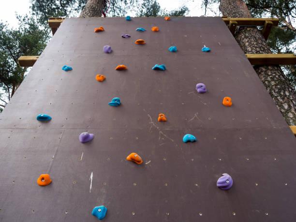 istock Wall climbing wall for training climbers in the park 653159850