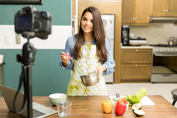 istock Food blogger recording a video 653160830