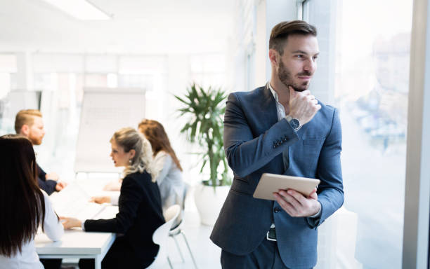 istock Handsome businessman ceo working in company office 653163624
