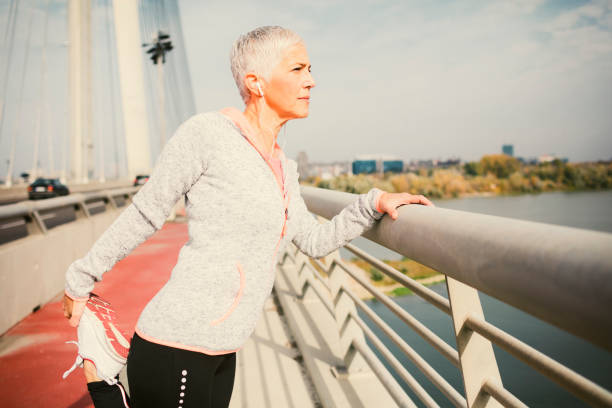 istock Mature Woman Streching after Running 653164354