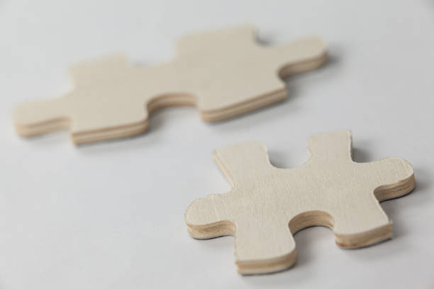 istock Two piece of jigsaw puzzle 653164380