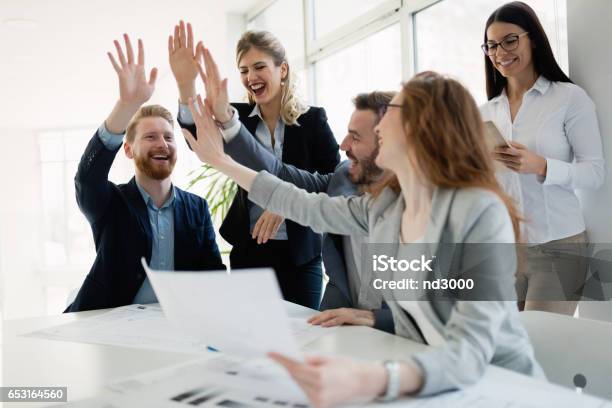 Successful Company Achieving Goals With Determined Staff Stock Photo - Download Image Now