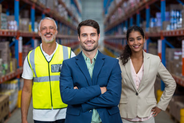 istock Portrait of warehouse team standing together 653171472