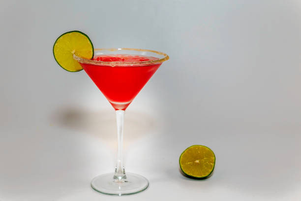 istock pomegranate martini with lime and sugar rimmed 653180536