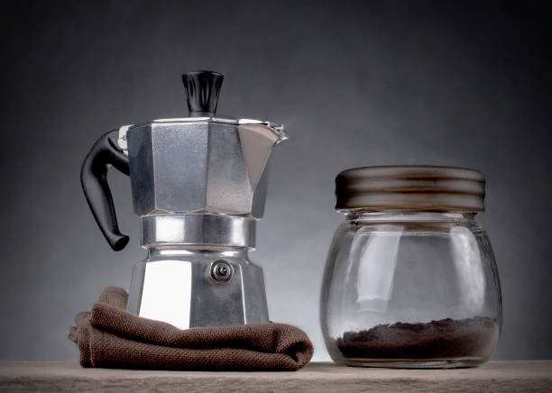 istock Coffee pot and coffee powder in bottle 653180828