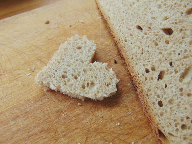 istock Bread with heart cut out of slice 653183606
