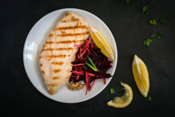 Grilled chicken breast with crunchy beetroot and apple slaw