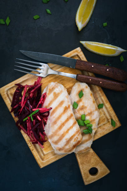Grilled chicken breast with crunchy beetroot and apple slaw