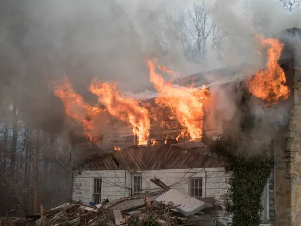 Photo of flames shooting from house